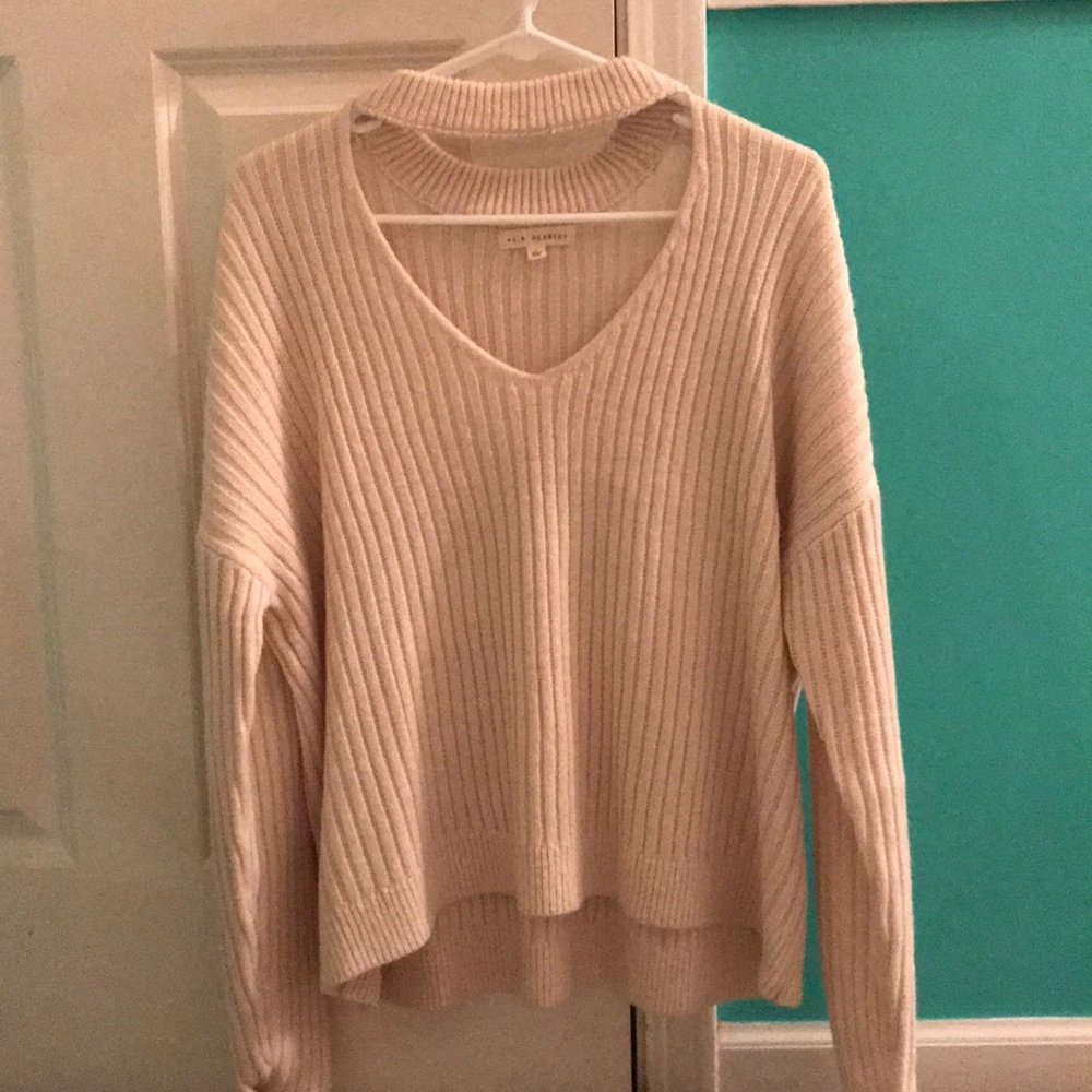 Cut out cream sweater